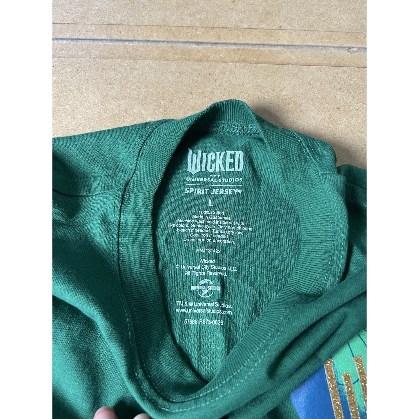Universal Studios T-Shirt Unisex L Green Long Sleeve Jersey Glitter Pullover