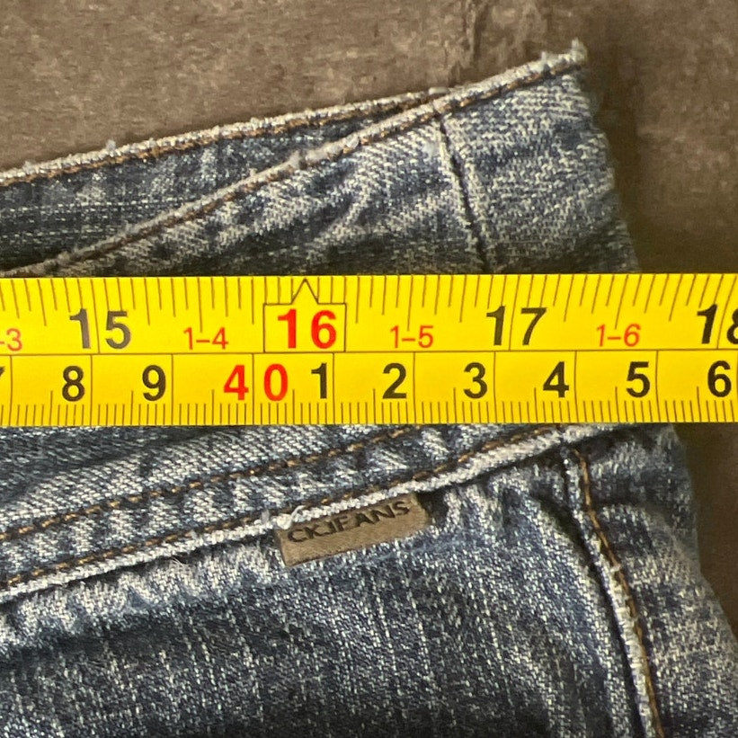 Calvin Klein Size 13 Faded Denim Women's Capri Jeans *Minor hole*